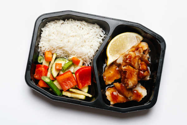 Sous vide Hake Fillet with Special Honey Soy and Lemon Wedge