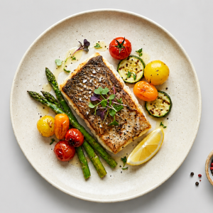 Baked Salt & Pepper Barramundi Fillet With A Lemon Wedge