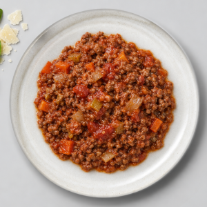 Photograph of Italian Beef Bolognese, served in a Food4Fitness meal container